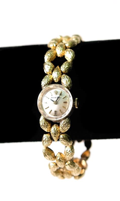 Sold at Auction: 1960's Rolex 14k YG Ladies Tree Bark Watch